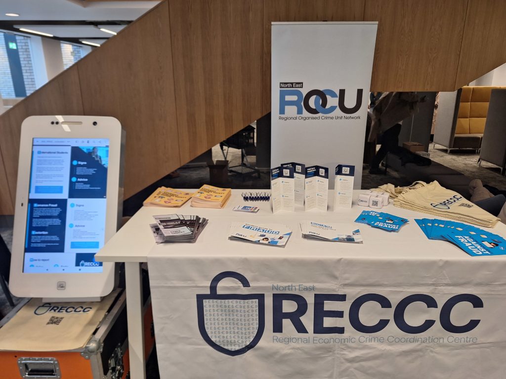 a table with a white tablecloth and a white banner